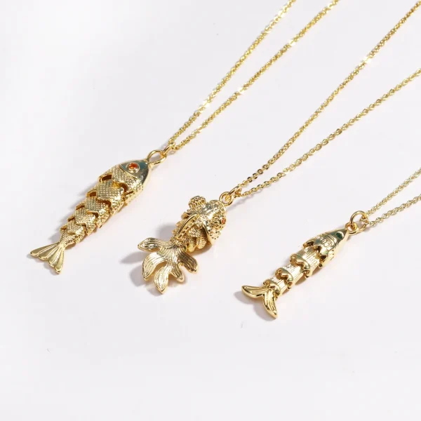 collier acier doré poisson